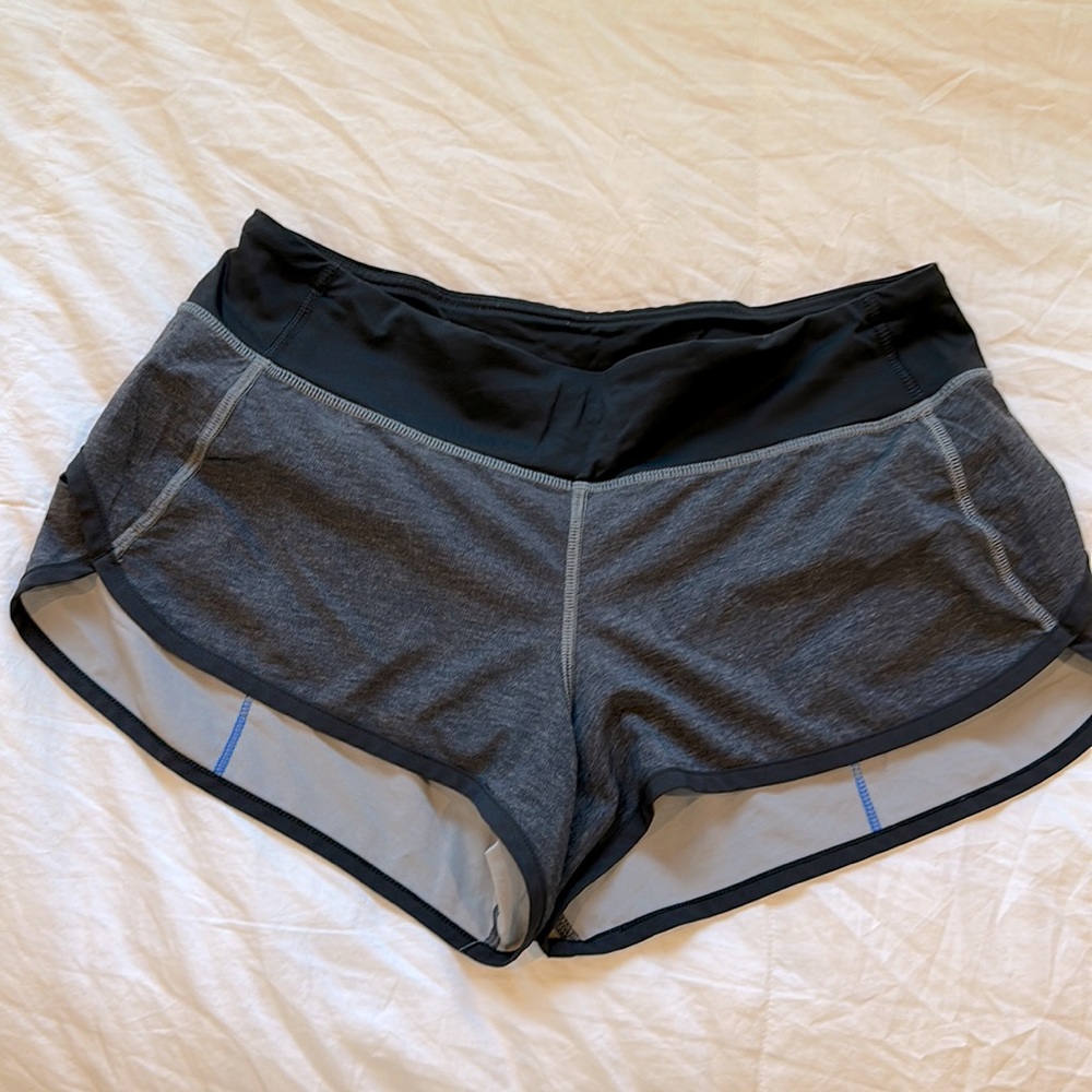 Lululemon speed short in gray/black and blue trim. Size 6